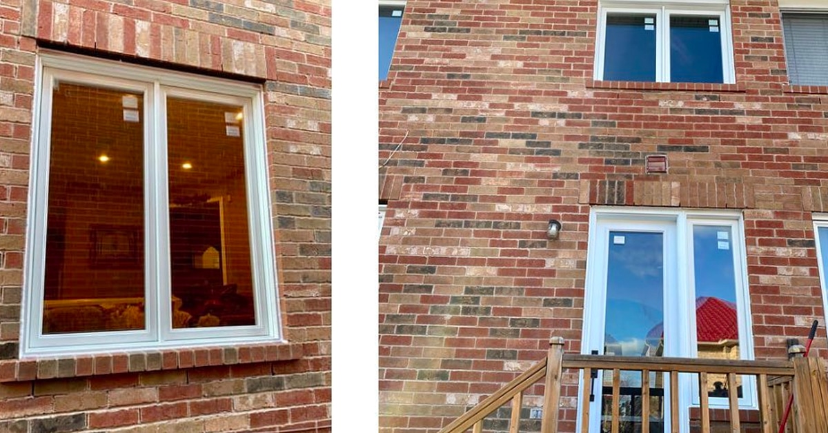 white window in brick house