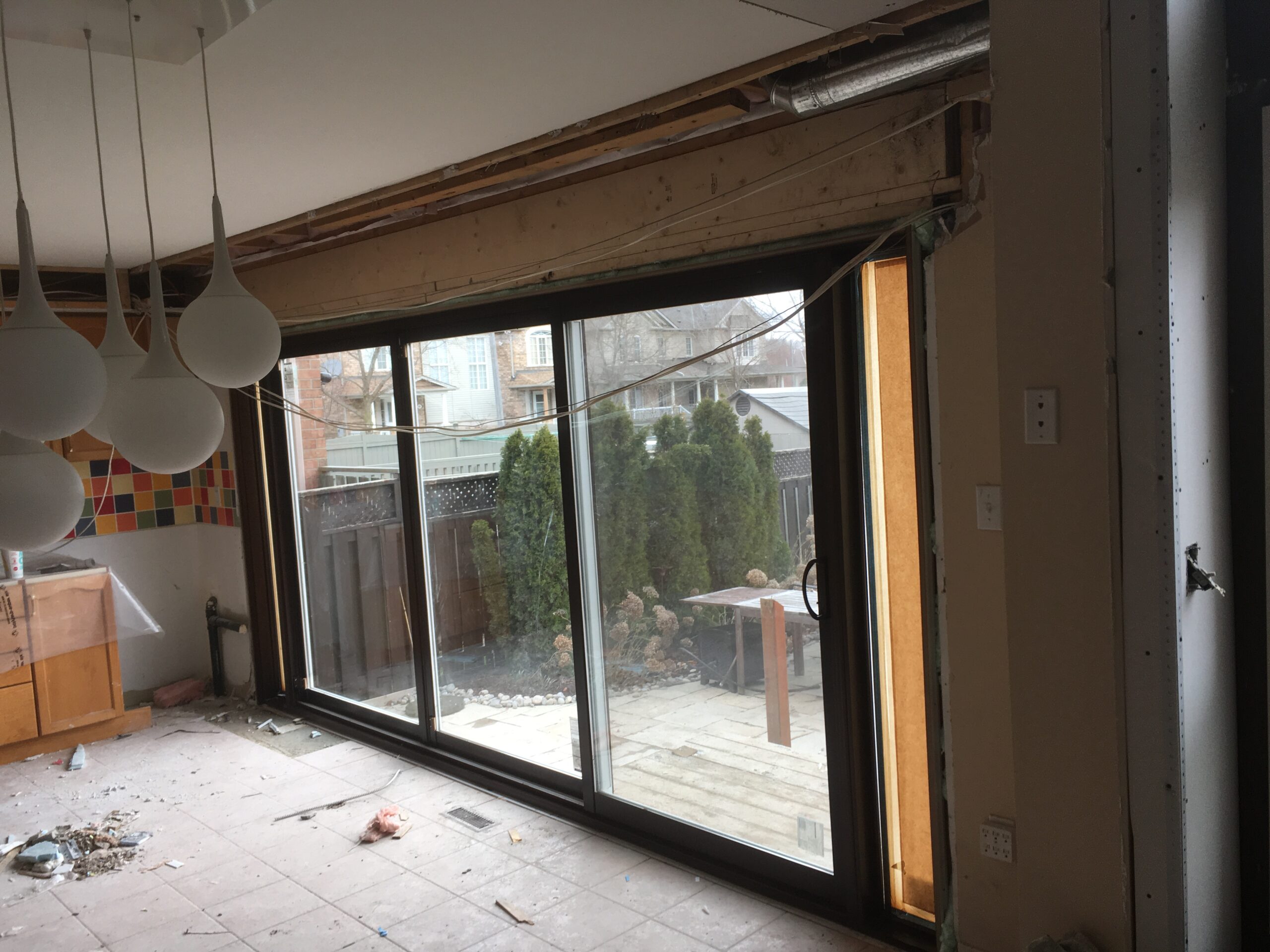 modern kitchen featuring a sliding glass patio door